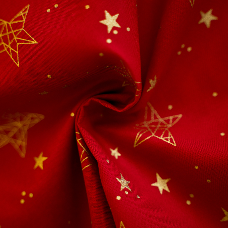 Baumwolle Weihnachtsstoff goldene Sterne auf rot