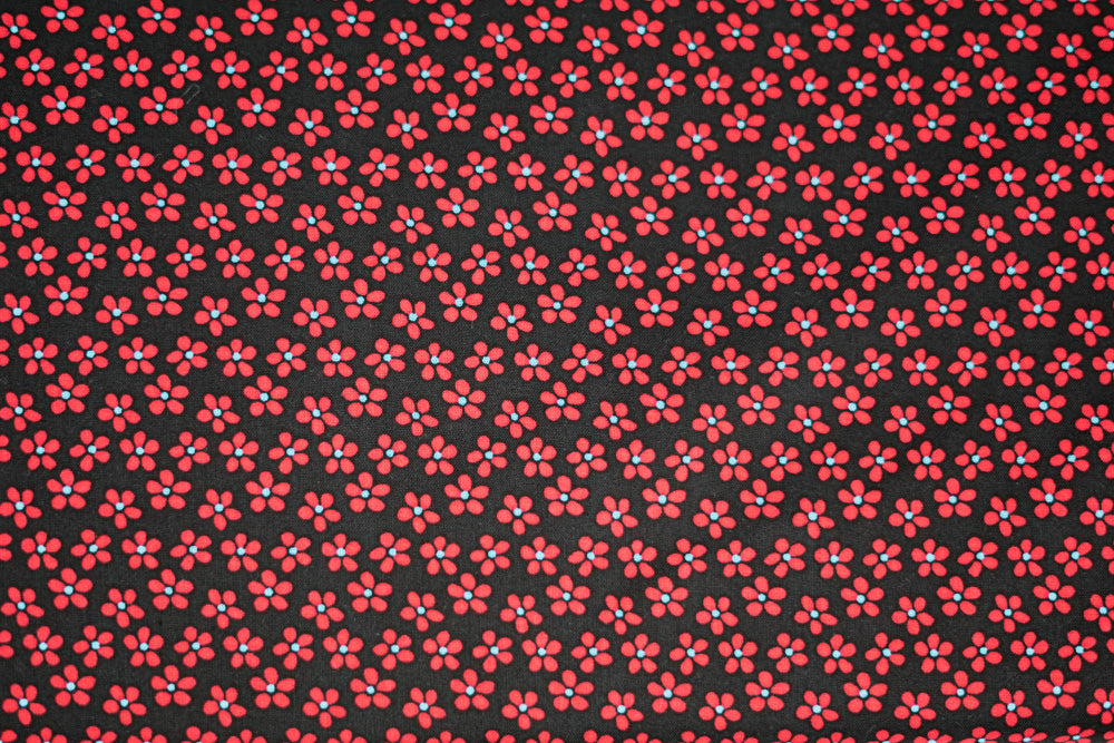 Baumwollstoff rote Blüten auf schwarz